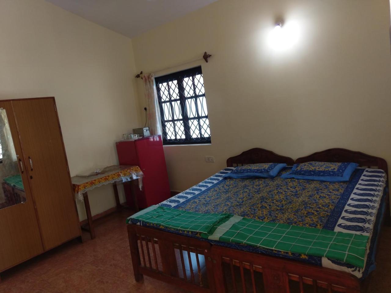 21In Guest House Calangute Szoba fotó